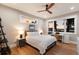 Bedroom with a desk and multiple windows offering lots of natural light at sunset at 581 Kingfisher Ln, Longboat Key, FL 34228