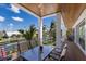 Spacious deck with views of canal and tropical foliage, perfect for outdoor entertaining at 581 Kingfisher Ln, Longboat Key, FL 34228