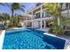 Multi-level coastal home with a private pool and outdoor entertaining space at 581 Kingfisher Ln, Longboat Key, FL 34228