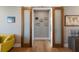 Hallway with sliding glass doors and wall art at 581 Kingfisher Ln, Longboat Key, FL 34228