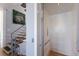 Hallway view that includes the elevator and stairs, and a peek at the modern architecture at 581 Kingfisher Ln, Longboat Key, FL 34228