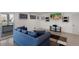 Cozy living room featuring comfortable seating and a TV at 581 Kingfisher Ln, Longboat Key, FL 34228