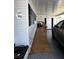 Exterior view of home with car port, ramp, showing door, and house number marker at 606 Cyprus Ct, Bradenton, FL 34207