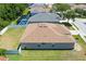 Spacious backyard area with a white fence, offering ample room for outdoor activities or gardening projects at 6106 34Th E Ct, Ellenton, FL 34222