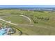 Aerial view of planned community and walking trails that run throughout the property at 6120 Plateau Ct, Bradenton, FL 34203