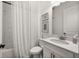 Clean bathroom features white cabinetry, and a shower with white marble-style tile at 6266 Mesa Gln, Bradenton, FL 34203