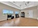 Well-equipped fitness room with hardwood flooring, windows and ceiling fans provides a great place for exercise at 6266 Mesa Gln, Bradenton, FL 34203