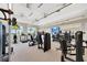 Modern gym offering a variety of exercise machines, free weights, TV and a mirrored wall for a complete workout at 6266 Mesa Gln, Bradenton, FL 34203