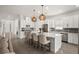 Spacious kitchen featuring a center island, stainless appliances, and ample counter space at 6266 Mesa Gln, Bradenton, FL 34203