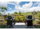 Outdoor grills with landscaping and well maintained lawns provide residents a relaxing place to enjoy outdoor cooking at 6266 Mesa Gln, Bradenton, FL 34203