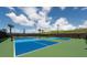 Outdoor pickleball courts provide a vibrant community space for recreational sports and activities under a clear sky at 6266 Mesa Gln, Bradenton, FL 34203