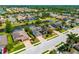 Aerial view showcasing the homes, landscaping and neighborhood at 7209 35Th E St, Sarasota, FL 34243