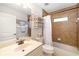 Bright bathroom featuring a tub-shower combo and vanity at 7209 35Th E St, Sarasota, FL 34243