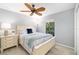 Bedroom with white furniture, neutral walls, and a view to the outside at 7209 35Th E St, Sarasota, FL 34243