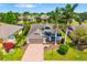 Charming single-Gathering home with a well-manicured lawn and a two-car garage at 7209 35Th E St, Sarasota, FL 34243