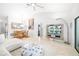 Open living and dining area with modern decor and plenty of natural light at 7209 35Th E St, Sarasota, FL 34243
