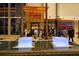 The Cheesecake Factory entrance at the mall, showcasing its inviting ambiance and lively outdoor seating at 7209 35Th E St, Sarasota, FL 34243