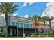 Exterior of The Capital Grille and Brio at the mall, set amongst palm trees and manicured landscaping at 7209 35Th E St, Sarasota, FL 34243