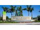 Sarasota Bradenton International Airport entrance sign with palm trees and landscaping at 7209 35Th E St, Sarasota, FL 34243