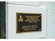 Plaque designating the building as a historic structure built in 1925 in Sarasota, Florida at 76 S Washington Dr, Sarasota, FL 34236