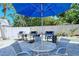Have fun grilling in the outside grilling area with shared cooking stations and umbrella-shaded patio seating at 777 Beach Rd # 1B, Sarasota, FL 34242
