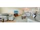 Open living room and dining area with view of modern furnishings and beach-themed decor at 777 Beach Rd # 1B, Sarasota, FL 34242