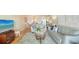 Cozy living room featuring stylish sofas, coastal decor, and a bright, inviting atmosphere at 777 Beach Rd # 1B, Sarasota, FL 34242