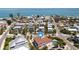 Aerial view of a stunning beach neighborhood with gorgeous homes and white sandy beach in the distance at 803 Gladiolus St, Anna Maria, FL 34216