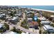 Aerial shot of a desirable residential area near beach with houses, pools, and stunning coastal views at 803 Gladiolus St, Anna Maria, FL 34216
