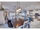 Open-concept home featuring a spacious dining area and bench seating for the dining table at 803 Gladiolus St, Anna Maria, FL 34216