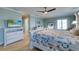 Bright main bedroom with a coastal theme, showcasing plenty of natural light and tasteful decor at 803 Gladiolus St, Anna Maria, FL 34216