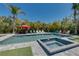 Beautiful backyard pool and hot tub area is perfect for relaxation and entertainment at 803 Gladiolus St, Anna Maria, FL 34216