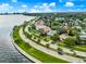 Breathtaking aerial view of waterfront homes featuring lush greenery and scenic views of the beautiful waterway at 829 Bayshore Blvd, Tampa, FL 33606