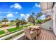 Cozy balcony with seating and beautiful views of the street and waterfront at 829 Bayshore Blvd, Tampa, FL 33606
