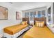 Sunlit bedroom boasts twin beds with woven headboards and stylish decor at 829 Bayshore Blvd, Tampa, FL 33606