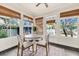 Charming breakfast nook with bright windows, a modern table, and views of the backyard at 829 Bayshore Blvd, Tampa, FL 33606