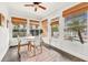 Bright breakfast nook with a ceiling fan and beautiful views of the pool and patio at 829 Bayshore Blvd, Tampa, FL 33606