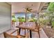 Spacious covered patio with dining table, ideal for outdoor entertaining and relaxation at 829 Bayshore Blvd, Tampa, FL 33606