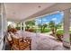 Inviting front porch with seating area, perfect for enjoying the neighborhood views at 829 Bayshore Blvd, Tampa, FL 33606