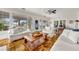 Bright living room with comfortable seating, hardwood floors, stained glass door, and views of the outdoors at 829 Bayshore Blvd, Tampa, FL 33606
