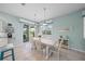 Cozy dining area adjacent to the kitchen with stylish furnishings and natural lighting at 8643 46Th Avenue W Cir, Bradenton, FL 34210