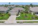 Well-maintained single-Gathering home features manicured lawn, lovely landscaping, and a two-car garage at 8643 46Th Avenue W Cir, Bradenton, FL 34210