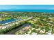 Stunning aerial view of a waterfront home featuring serene waterways and lush landscaping at 9226 13Th Avenue Nw Cir, Bradenton, FL 34209