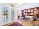 Bright and inviting foyer with a view into an exquisitely furnished living room at 9226 13Th Avenue Nw Cir, Bradenton, FL 34209