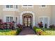 Inviting entryway with manicured landscaping and a decorative front door at 9226 13Th Avenue Nw Cir, Bradenton, FL 34209