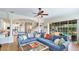 This open floorplan features a living room connected to a kitchen with stainless appliances at 9226 13Th Avenue Nw Cir, Bradenton, FL 34209