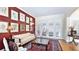 Inviting living room with elegant furnishings, a decorative rug, and bright windows at 9226 13Th Avenue Nw Cir, Bradenton, FL 34209