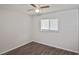 Clean bedroom featuring modern floors, a ceiling fan, and a bright window at 1011 Bacon Ave, Sarasota, FL 34232