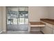 Bright eat-in kitchen with access to the screened porch at 1011 Bacon Ave, Sarasota, FL 34232
