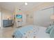 Charming bedroom with coastal decor and a mounted television at 1021 Crescent St # 1, Sarasota, FL 34242